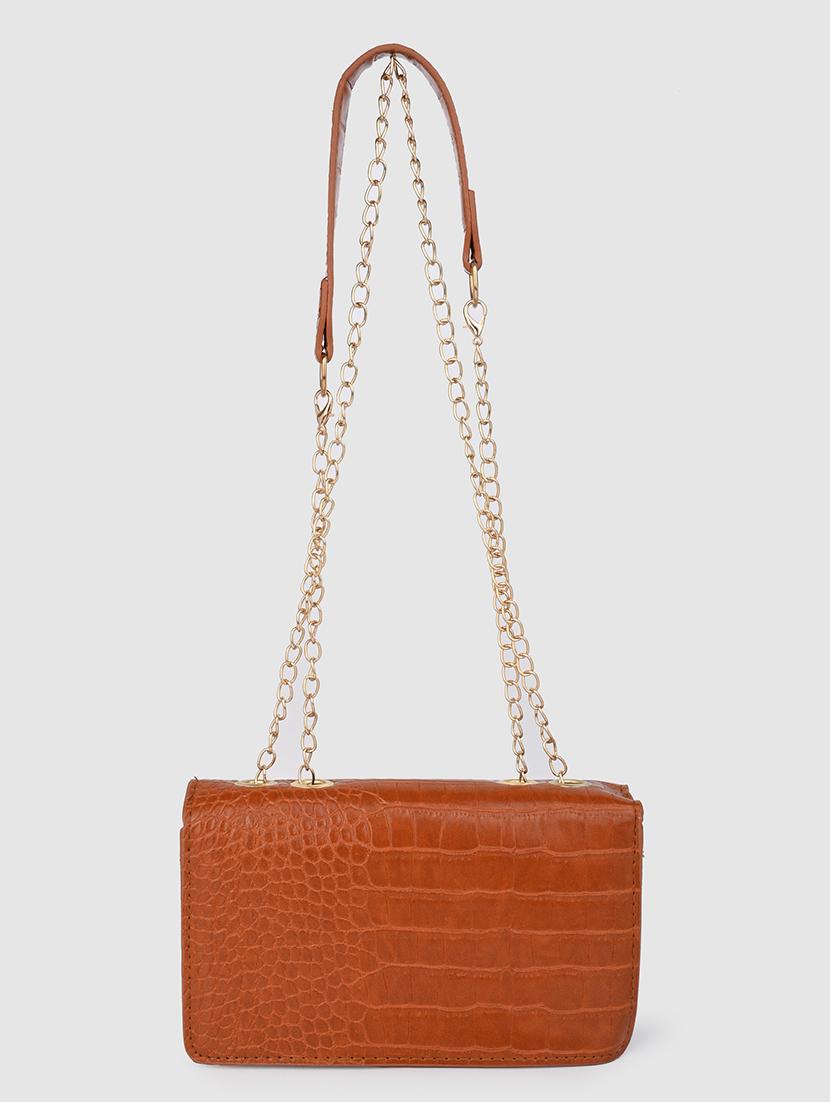 brown textured handbag - 21457081 - Standard Image - 2