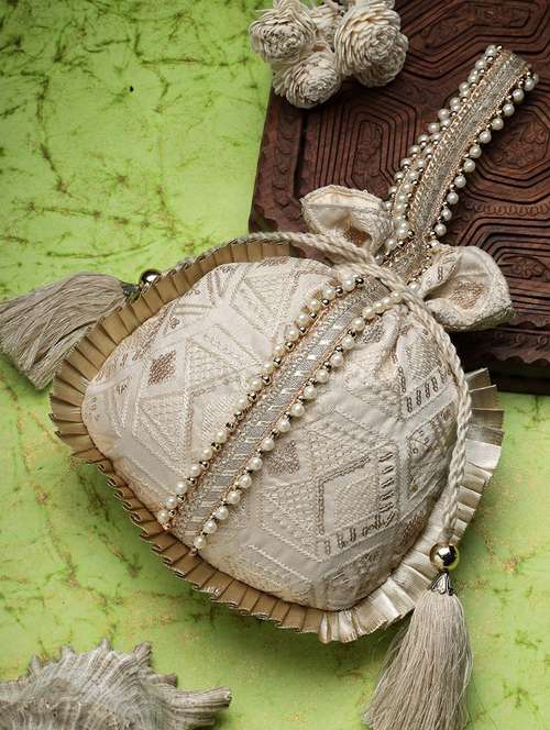 beige embroidered silk potli