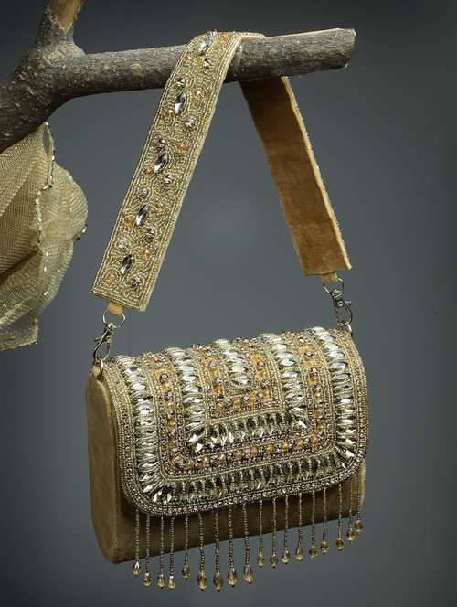 women embellished  fold over clutch