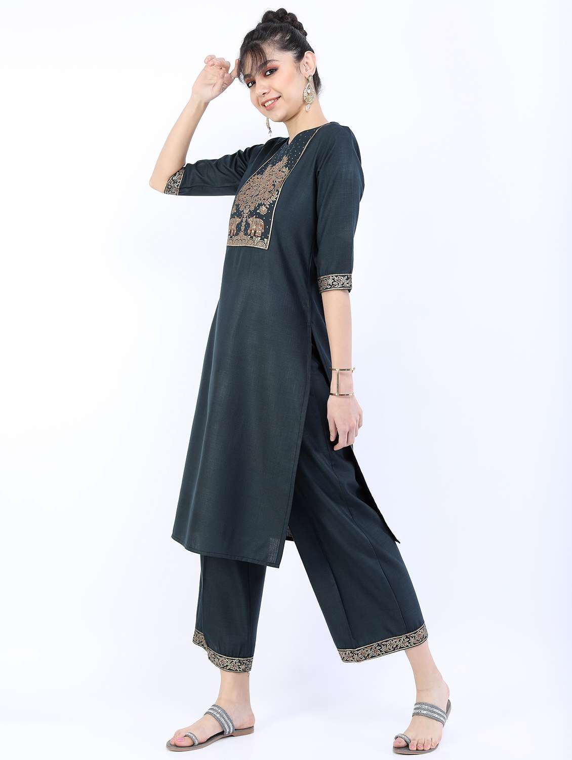 women green round neck kurta palazzo set