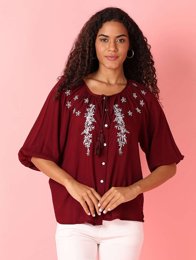 women embroidered tie up neck top