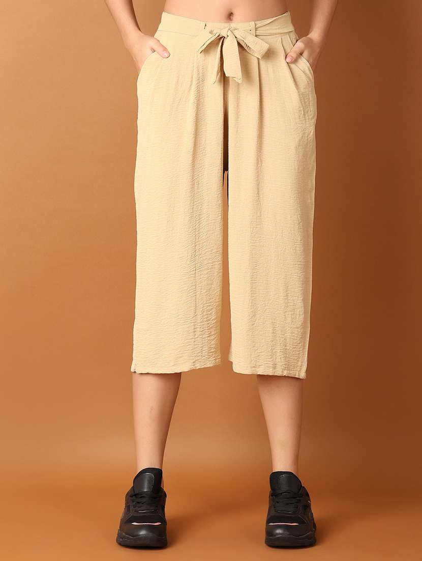 women beige solid capri