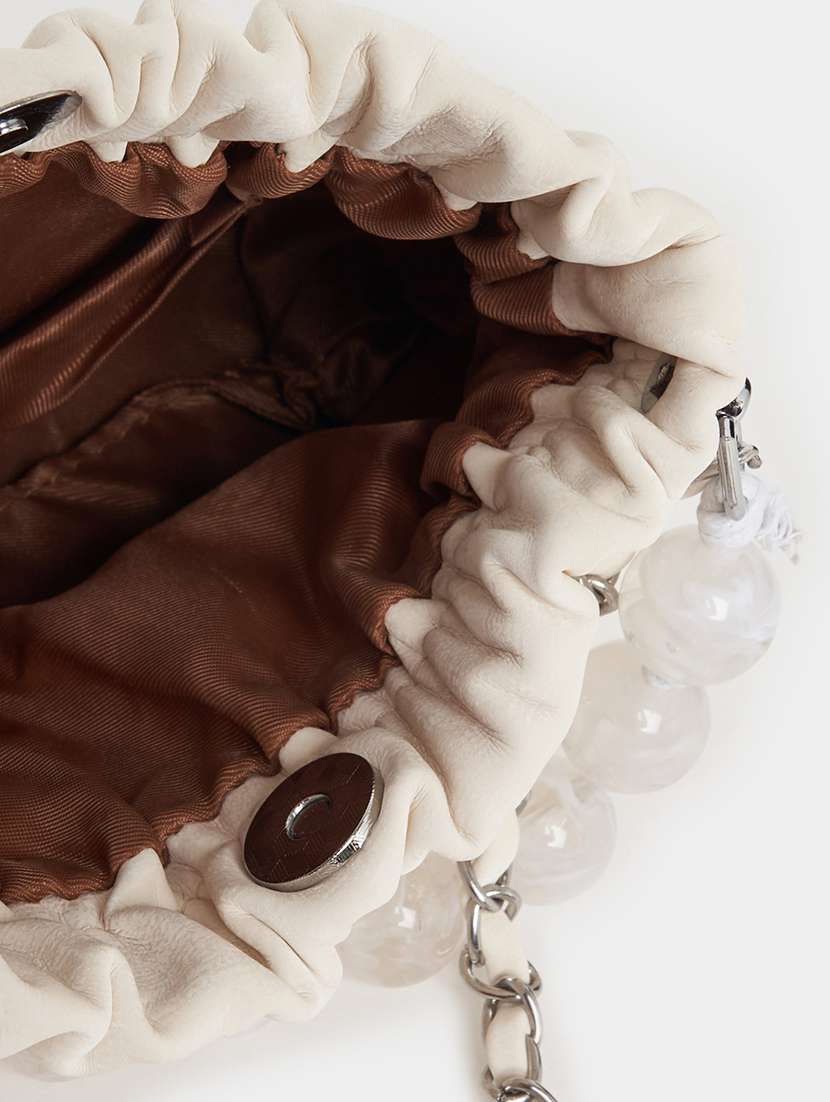 women cream solid handbag - 21505973 -  Standard Image - 2