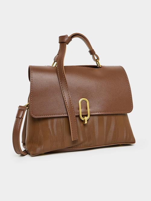 women brown textured handbag - 21510716 -  Standard Image - 0