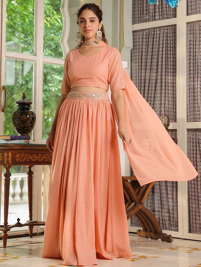 women orange flared lehenga