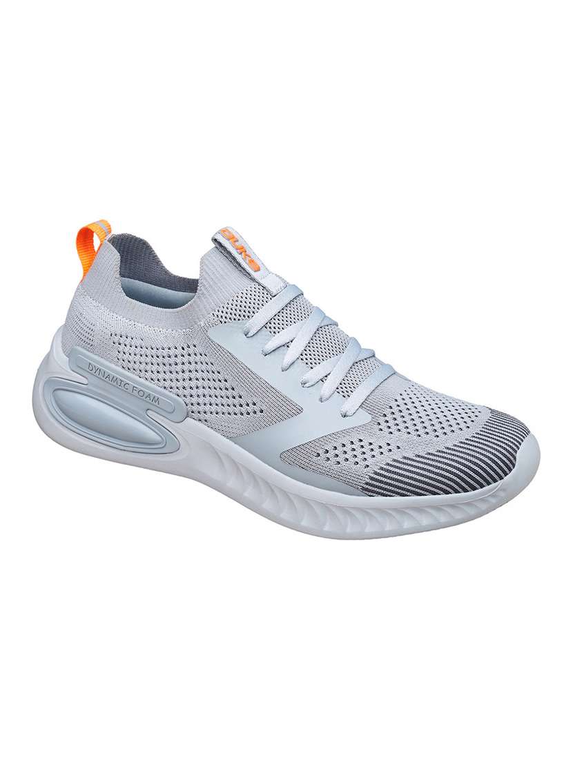 men grey running sport shoes