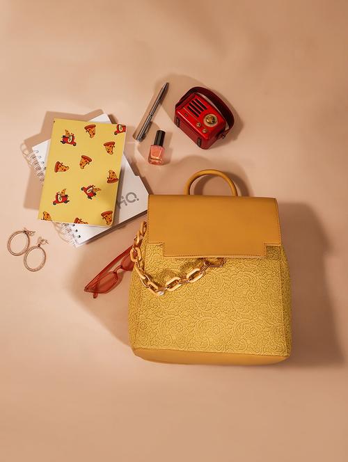 yellow textured leatherette backpack - 21562335 - Standard Image - 0