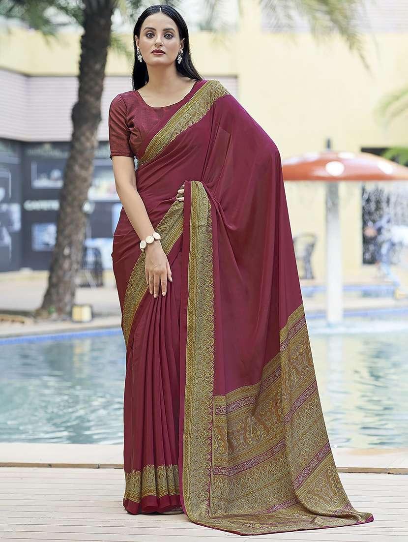 women solid printed bordered saree