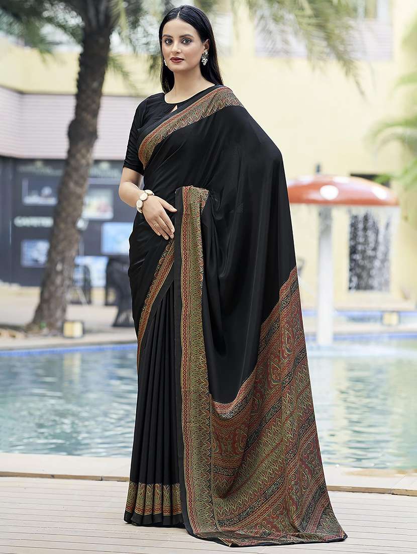 women solid printed bordered saree