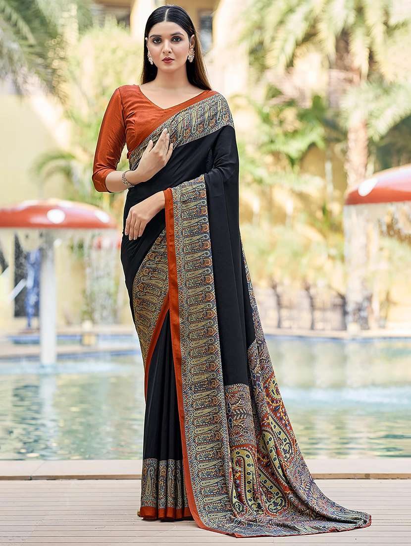 women black solid printed bordered saree