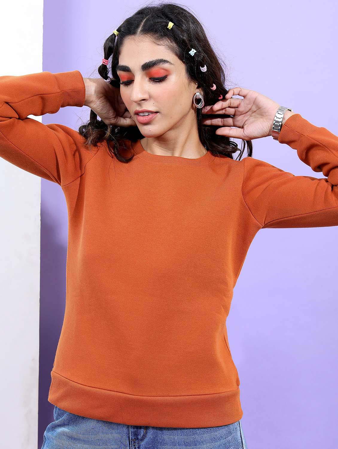 women orange plain sweatshirt