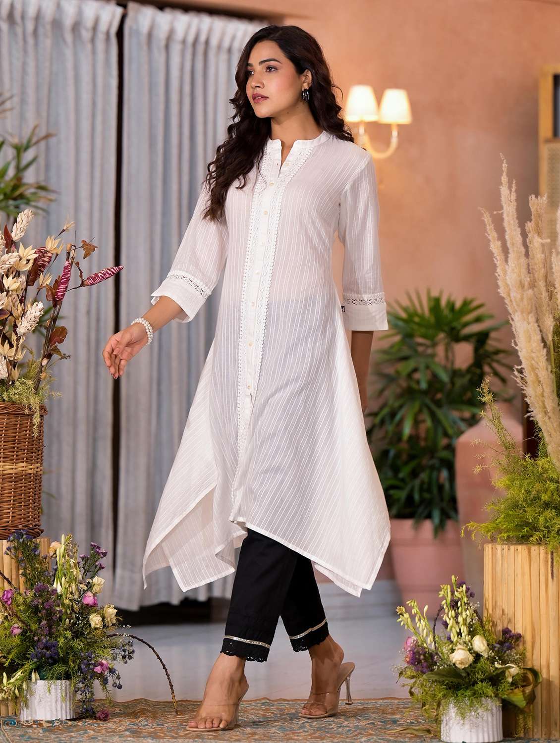 women striped three quarter sleeves asymmetric kurta - 21606788 -  Standard Image - 2