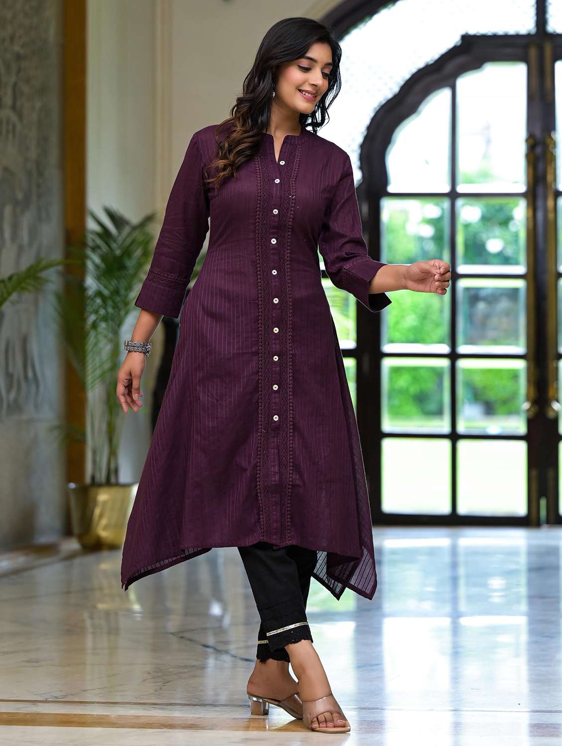 women striped three quarter sleeves asymmetric kurta - 21606789 -  Standard Image - 2