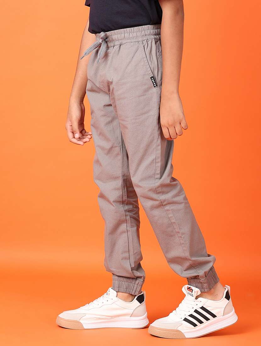 kids beige solid joggers - 21613434 -  Standard Image - 2