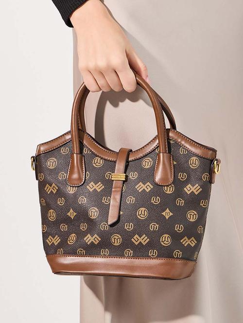 women brown textuered handbag - 21618118 -  Standard Image - 0