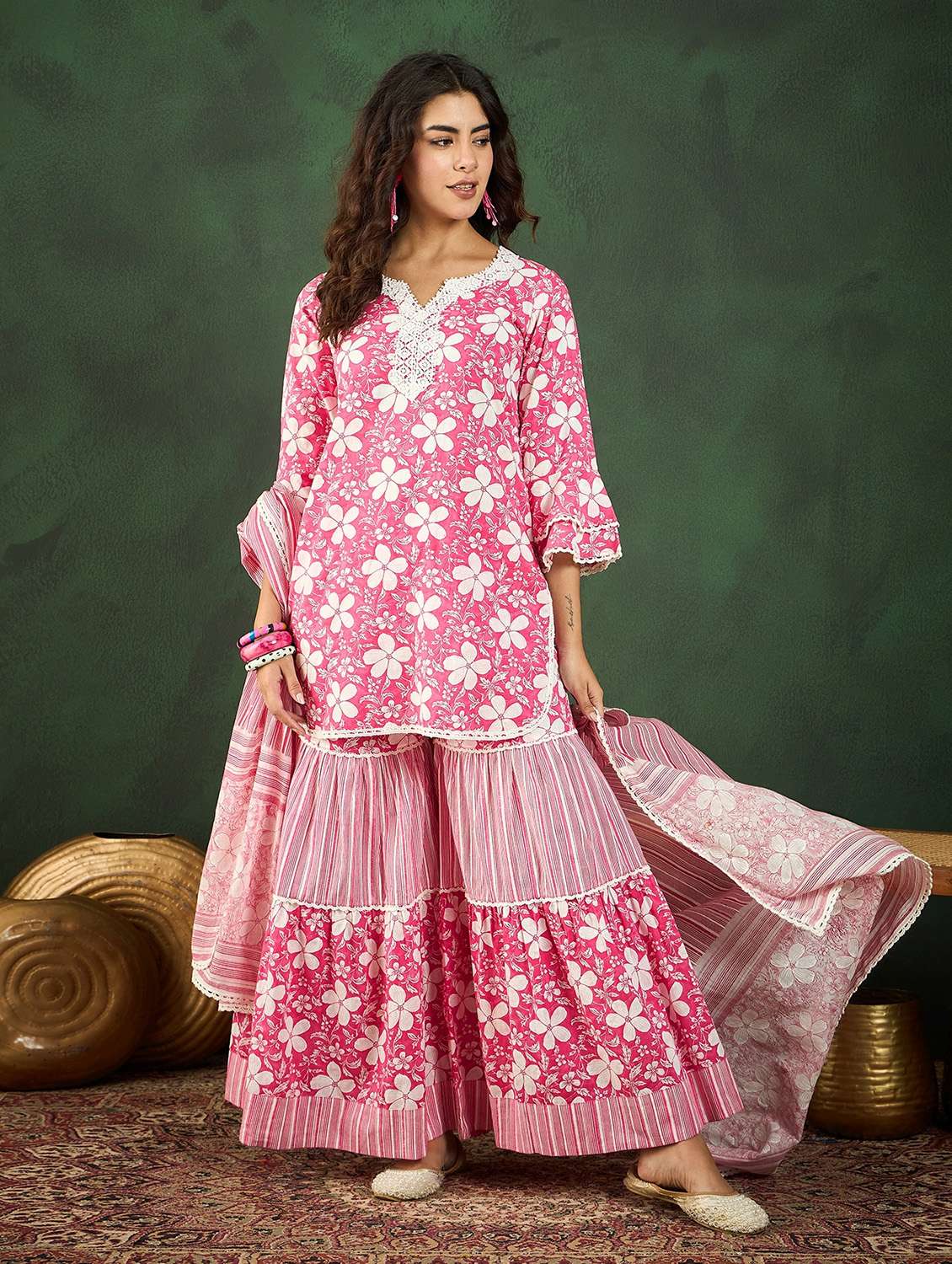 women pink bell lseeve kurta sharara set