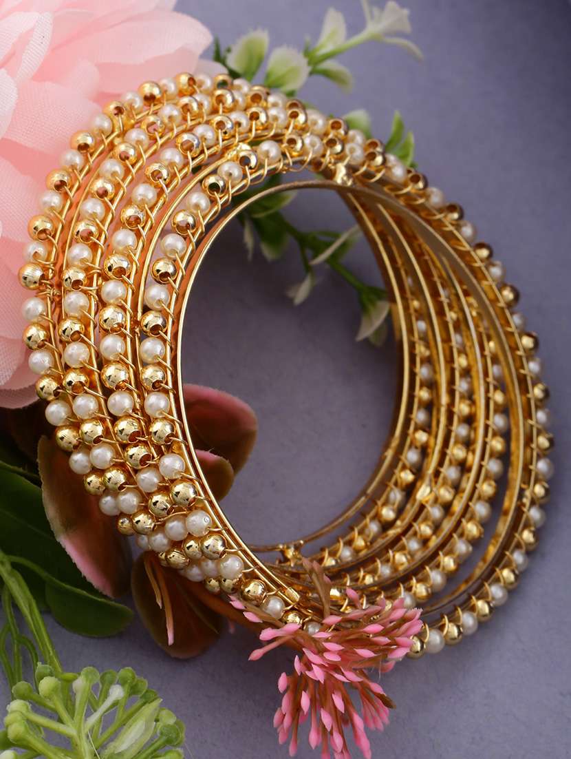 women gold plated pearl bangles - set of 4