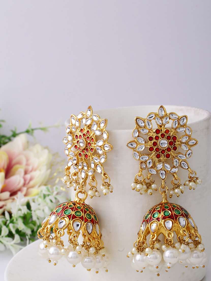 women gold jhumka earrings