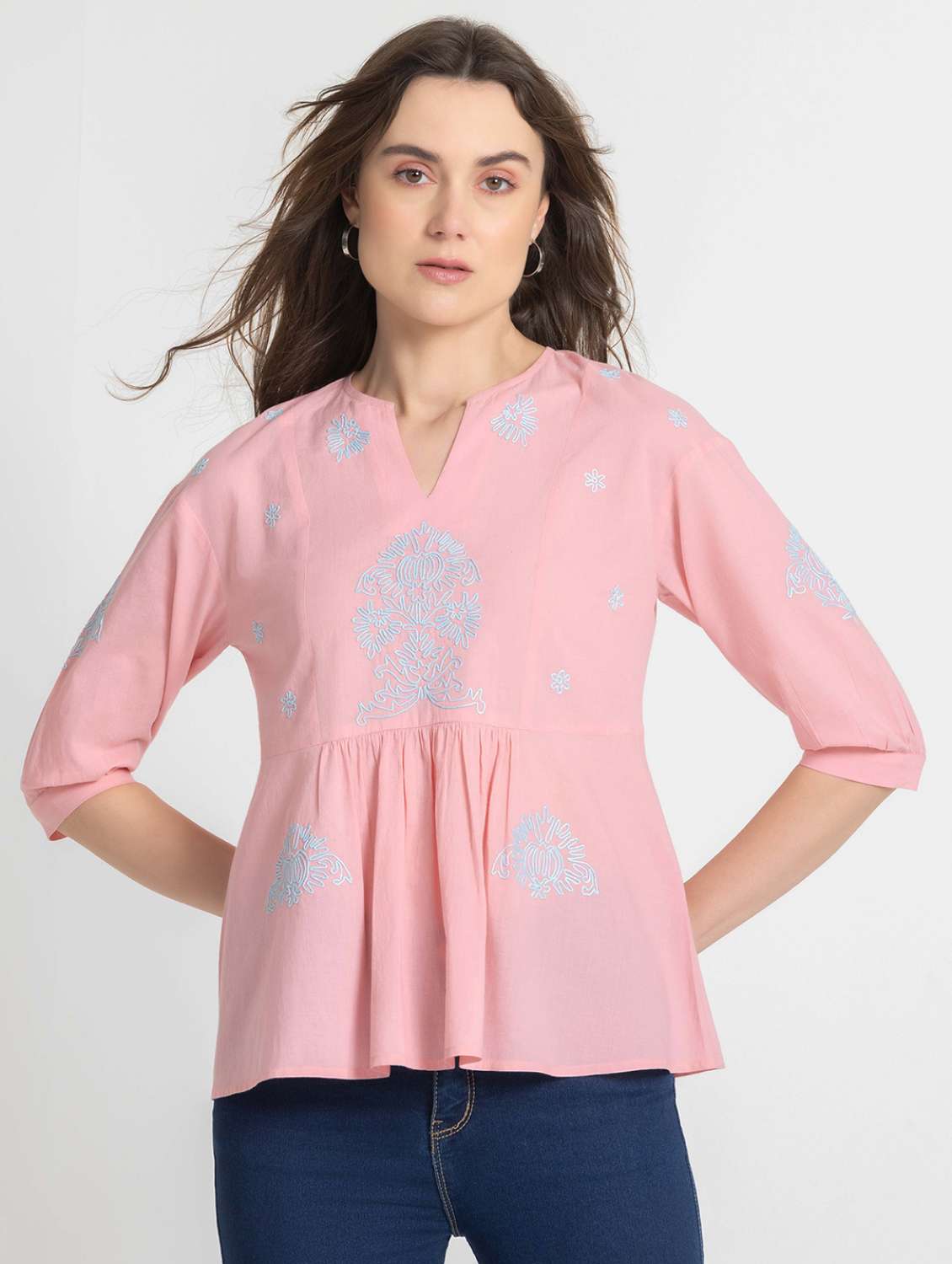 women pink embroidered peplum top