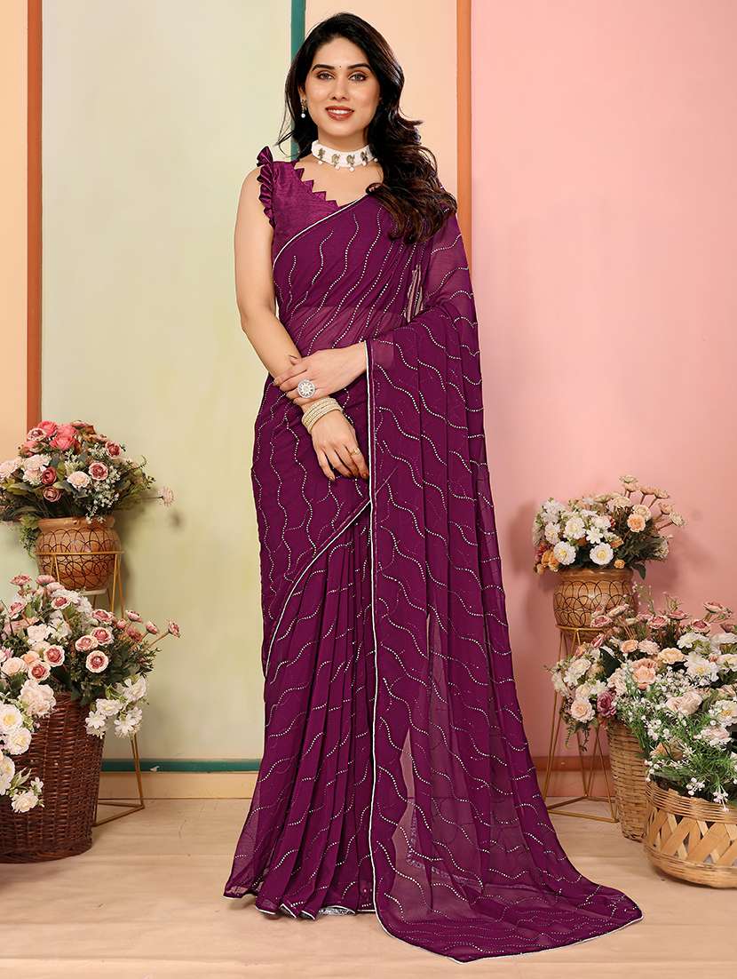 women solid with work embellished saree with blouse