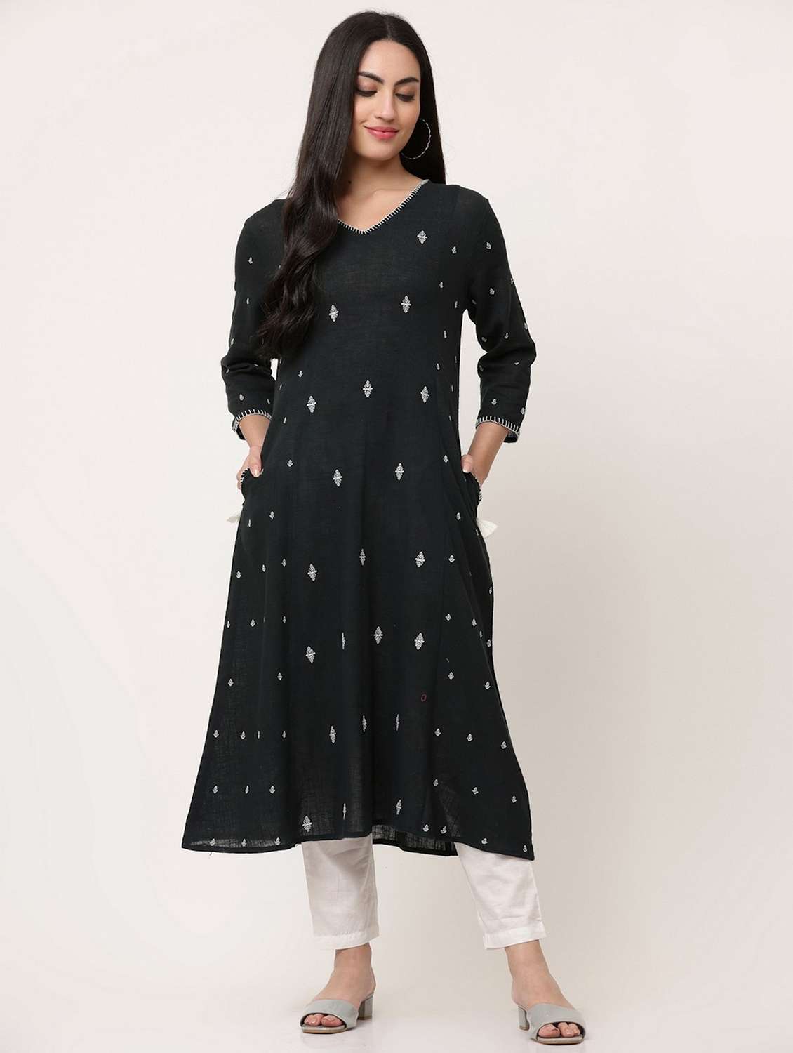 women embroidered three quarter sleeve a-line kurta