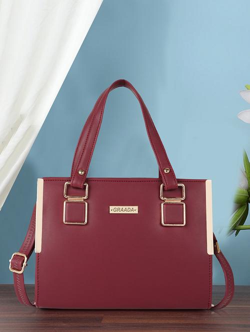 women maroon plain handbag - 21646719 -  Standard Image - 0