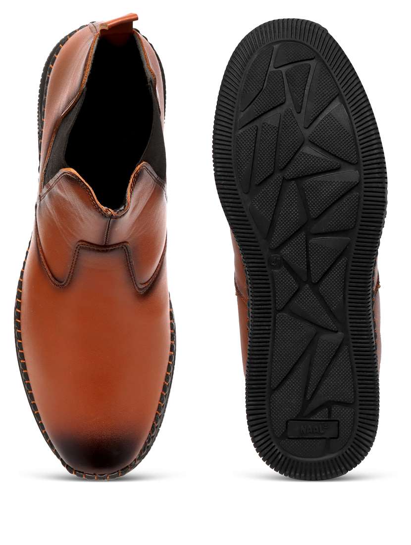 men tan slip on boots - 21647363 -  Standard Image - 2