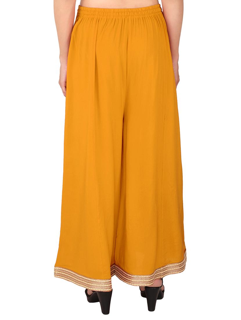women yellow solid flared palazzos - 21652698 - Standard Image - 2