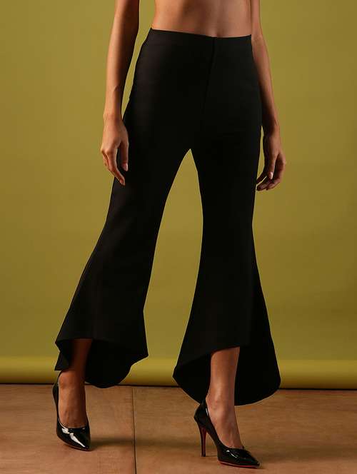 globus women black solid stretchable mid-rise high-low bottom hem flared party treggings - 21671754 -  Standard Image - 0