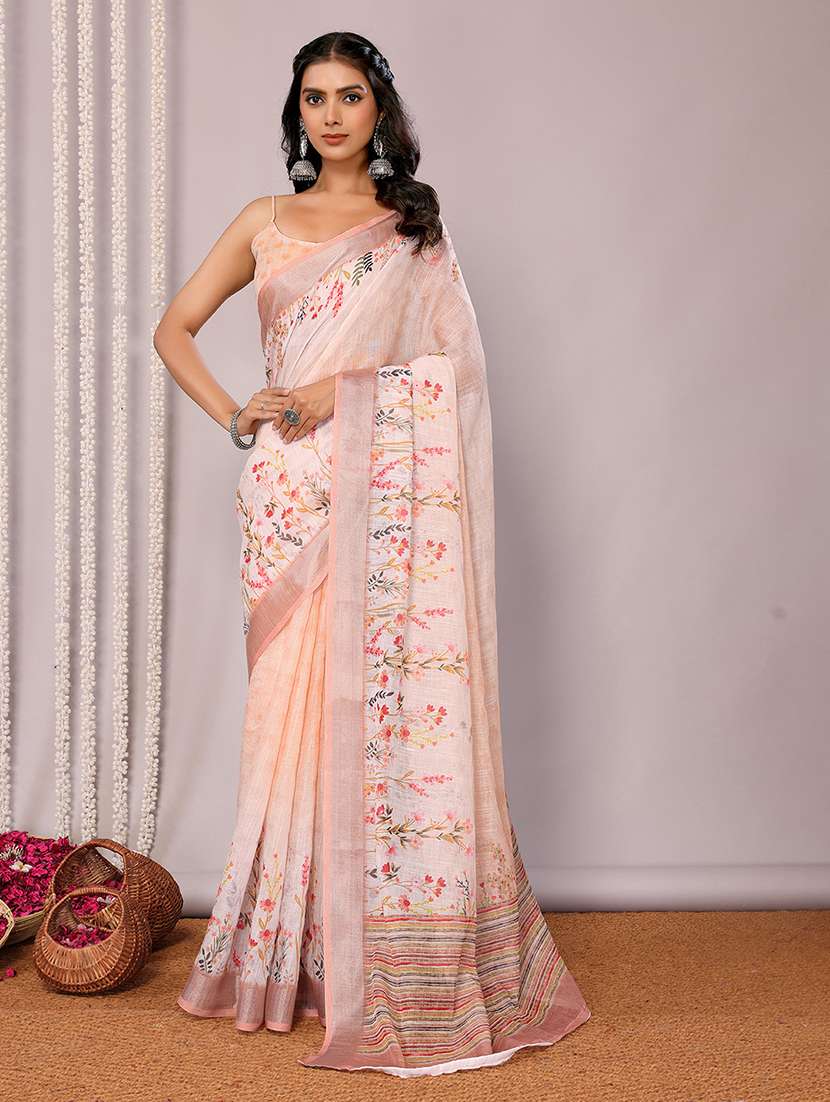women peach printed saree with blouse