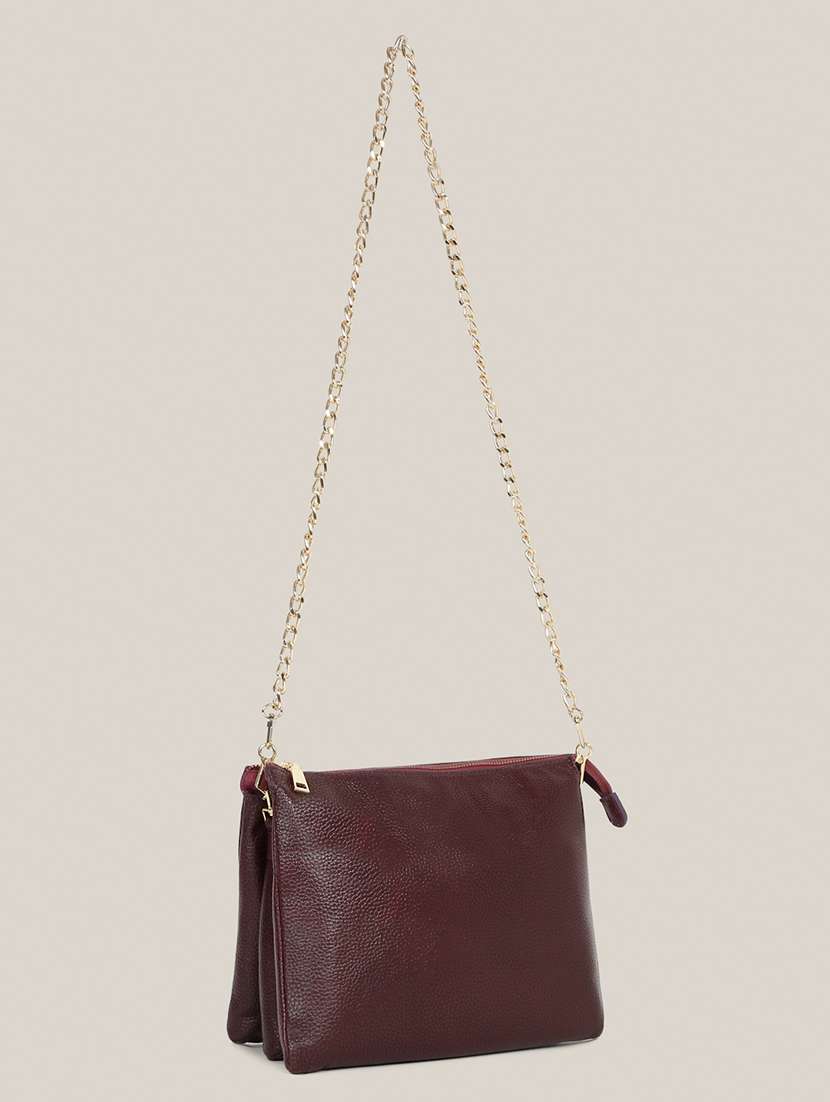 women solid sling bag