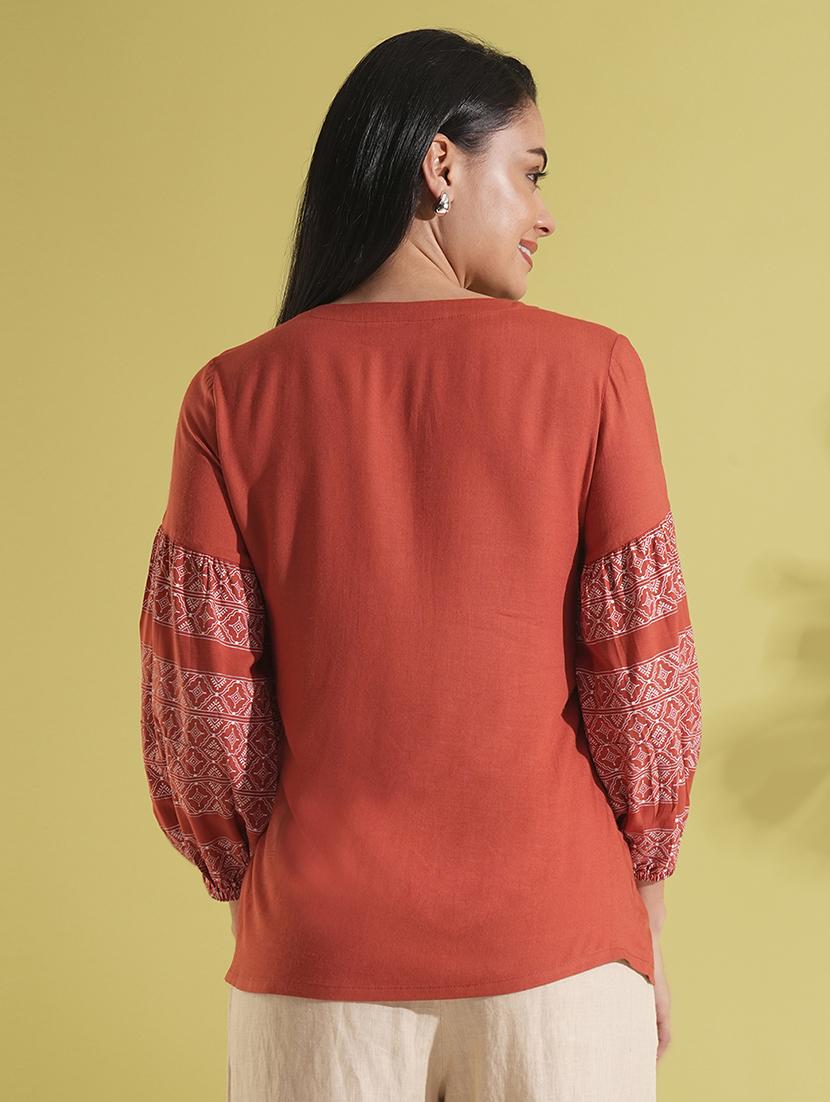 globus women rust tie-up round neck bishop sleeves ethnic print gathered a-line workwear tunic - 21704493 - Standard Image - 2