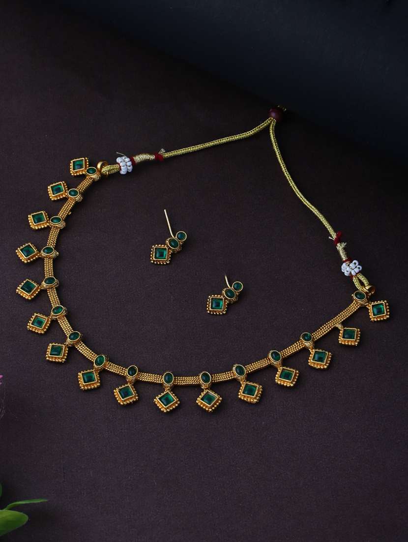 green and gold stone studded jewellery set