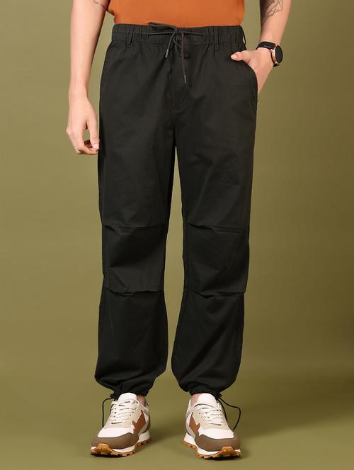 men black mid rise solid jogger - 21717983 - Standard Image - 0