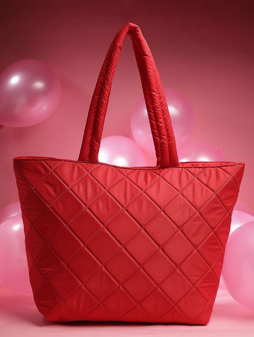 women red solid quilted handbag