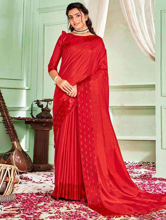women solid bordered saree with blouse