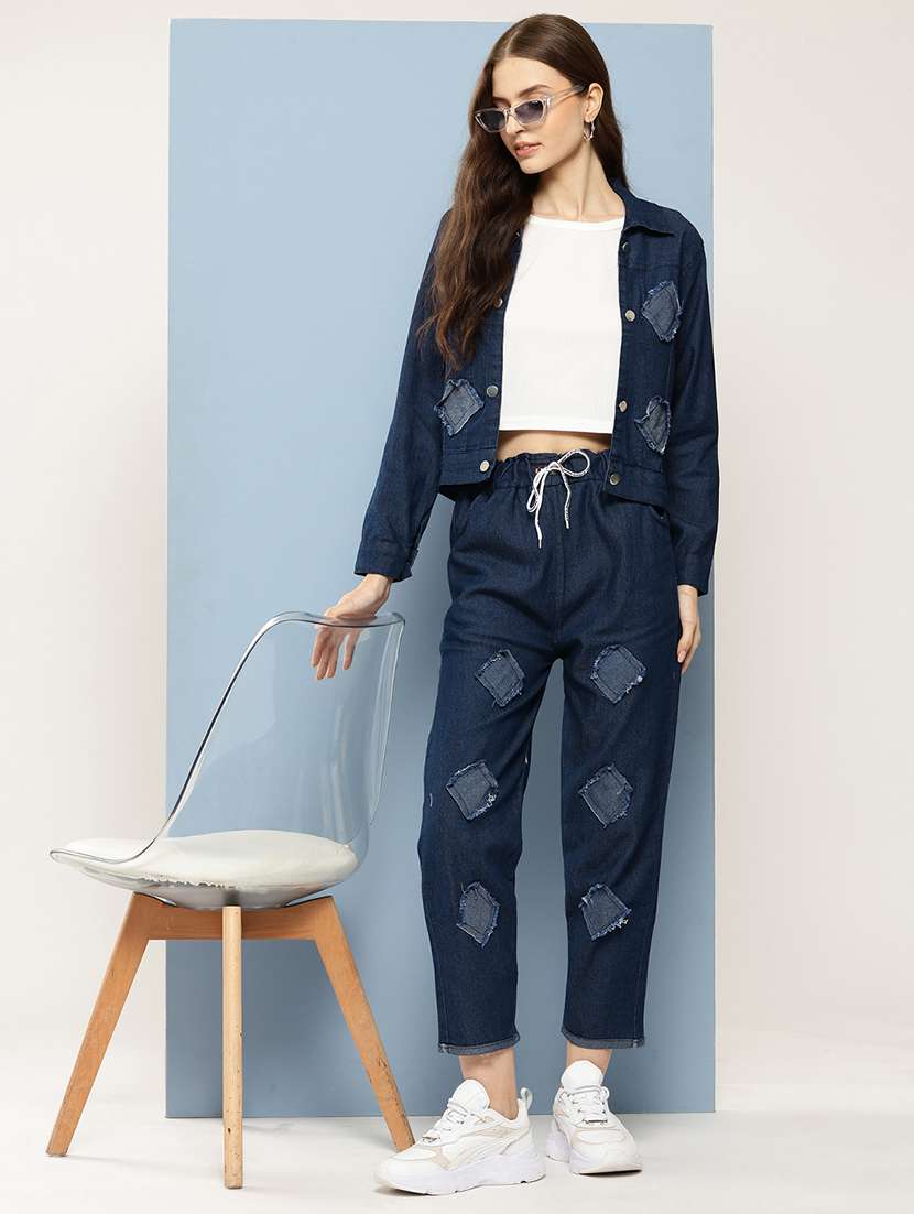 wome crop top and patched jacket with jeans 