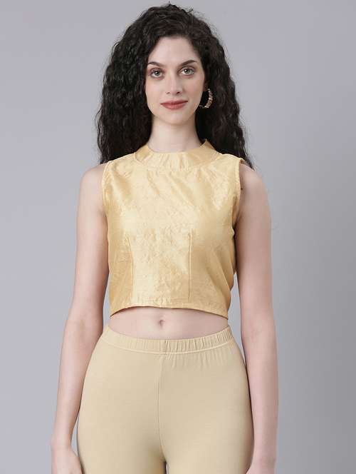 women beige solid stiched blouse