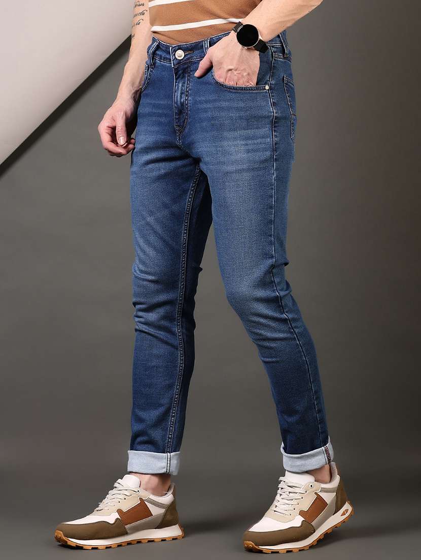 men washed mid rise jeans - 21731515 -  Standard Image - 2