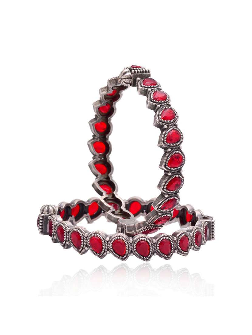 women stones studded silver bangles set