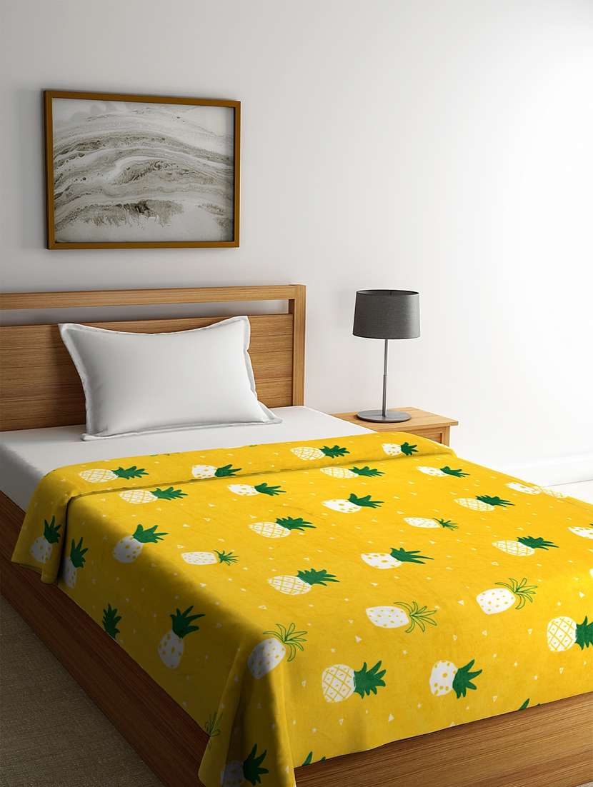 yellow printed light weight blanket