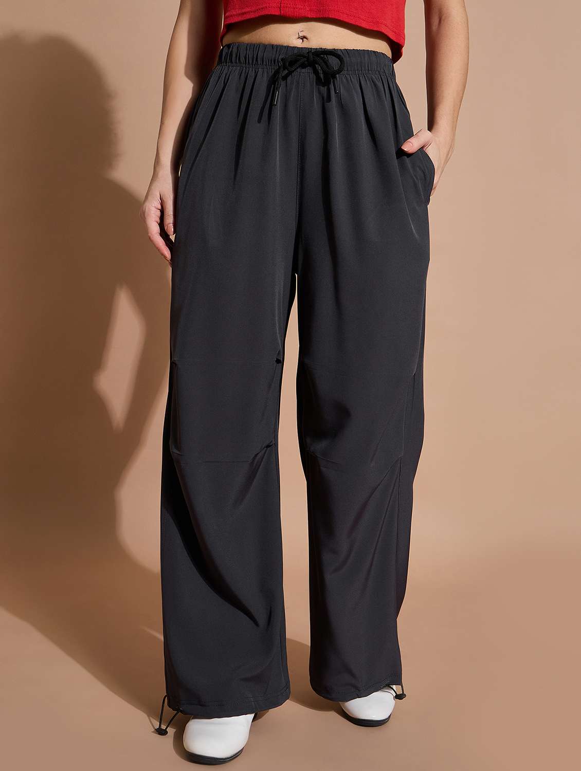 women solid high rise parachute pants