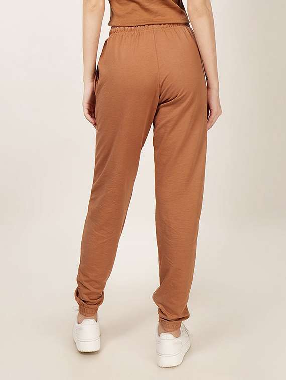 women solid mid rise joggers - 21739469 - Standard Image - 2