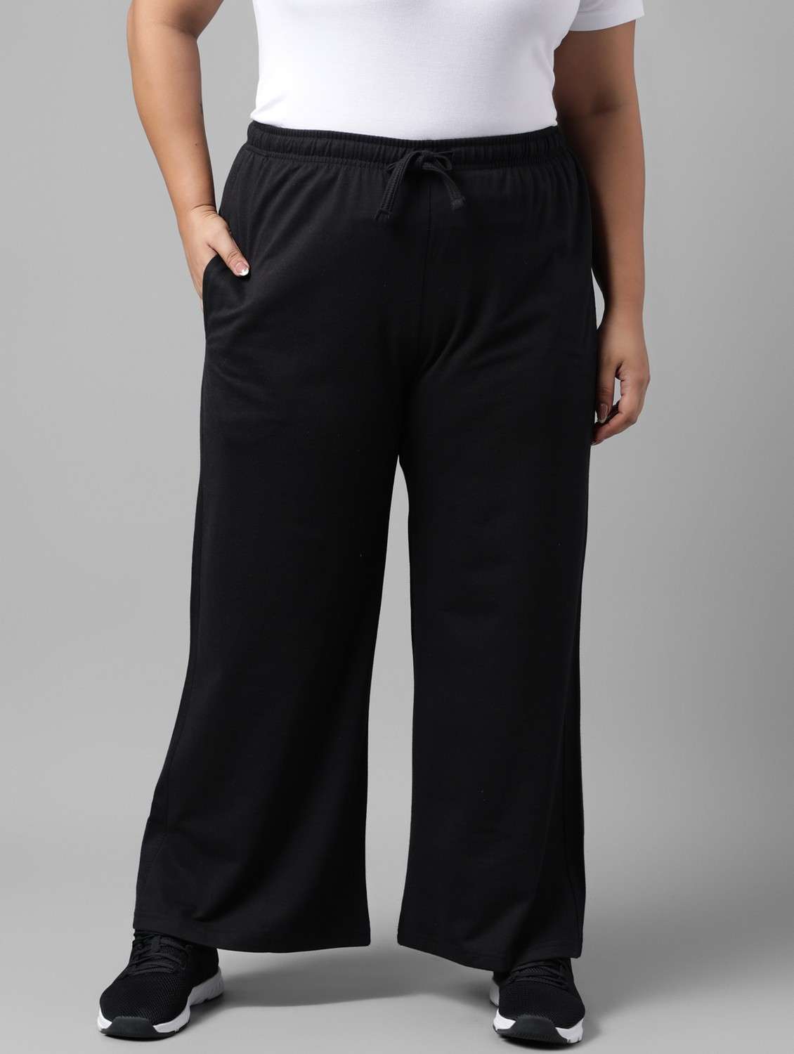women plus size solid mid rise track pant