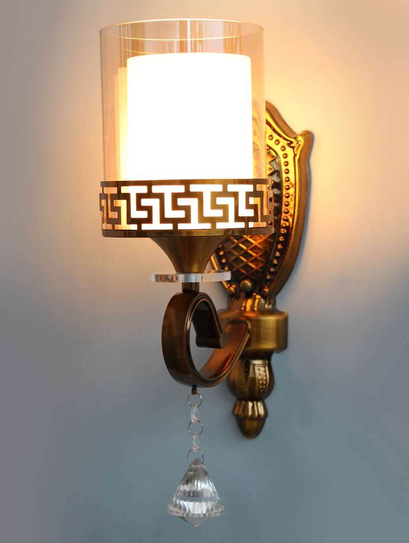 golden finish wall light with cylindrical dual arm | clear glass