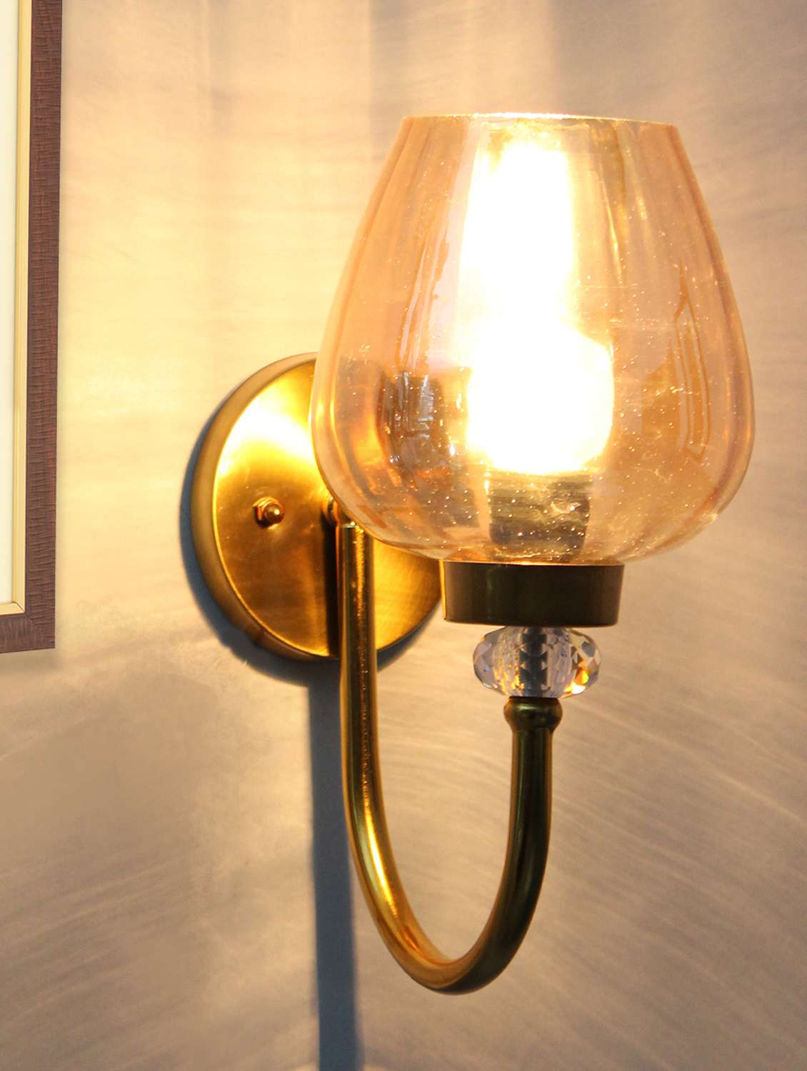 luxury vintage golden finish wall sconce with amber glass