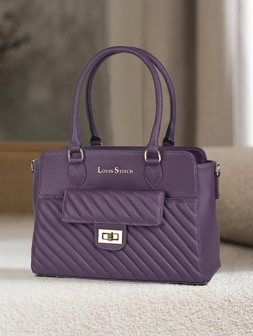 women purple textured handbag - 21768081 -  Standard Image - 0