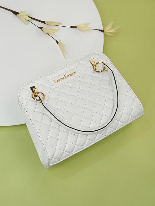 women white textured handbag - 21768086 -  Standard Image - 0