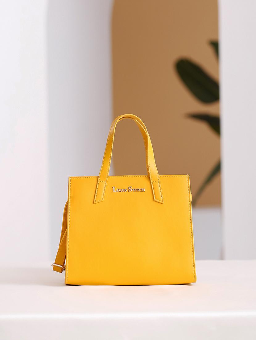 women yellow solid handbag - 21768098 - Zoom Image - 0