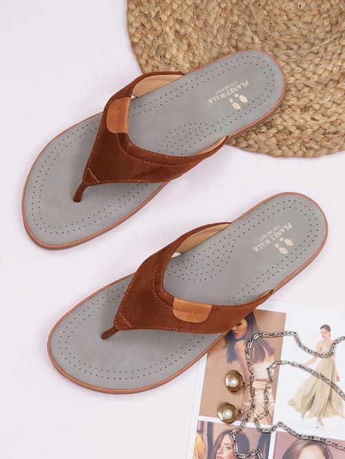 women tan toe separator flip flop - 21768147 -  Standard Image - 0